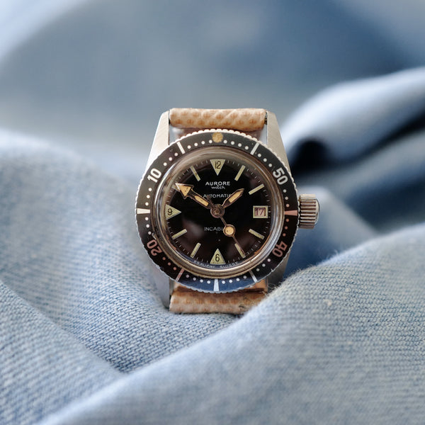 Montre ancienne femme mini submariner