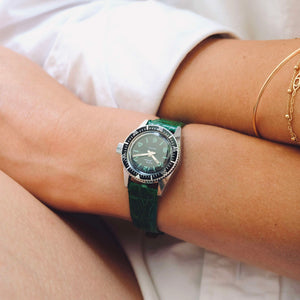 Montre ancienne femme submariner