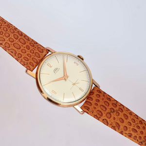 Montre ancienne or et marron