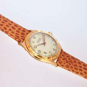 Montre ancienne plaquée or ultra-slim courtoise