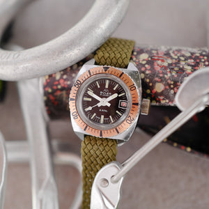Montre ancienne pour femme mini Submariner