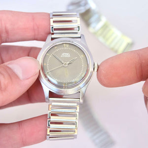 Montre bracelet acier mécanique histoire