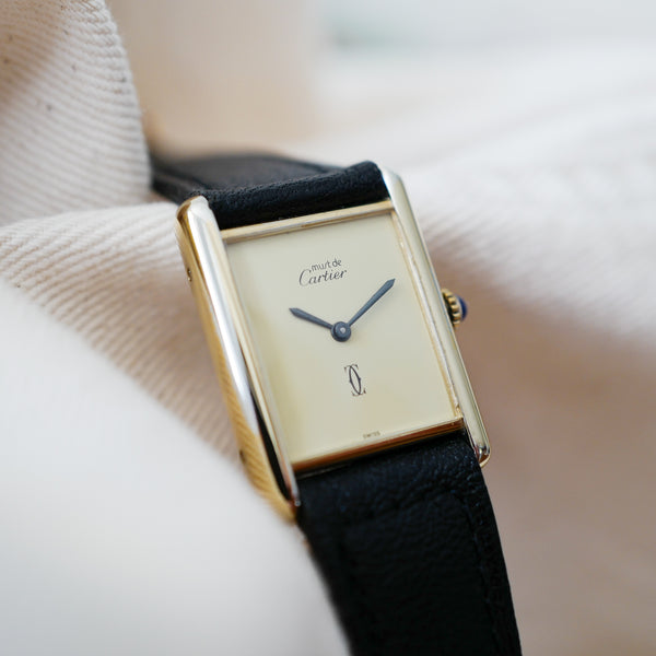montre cartier must tank cadran creme jaune pale