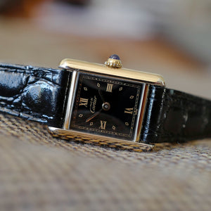 montre cartier tank femme cadran noir