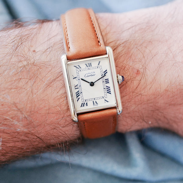 Montre Cartier Tank argent vintage grand modèle homme femme boucle déployante