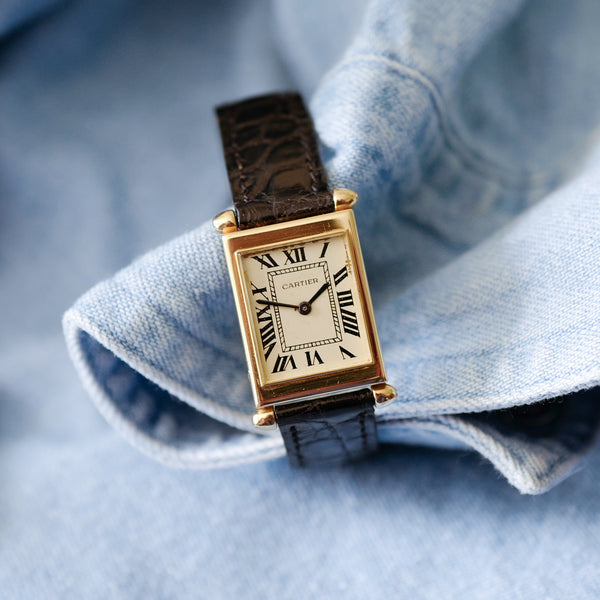 Montre Cartier Tank obus vintage en or jaune
