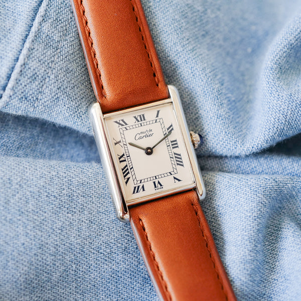 Montre Cartier vintage cadran blanc bleu argent