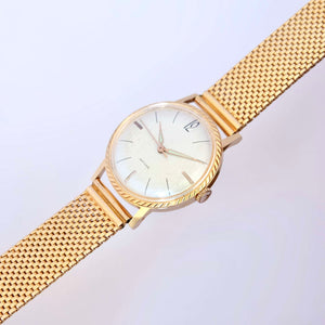 Montre costume anonyme fine années 1960 plaquée or