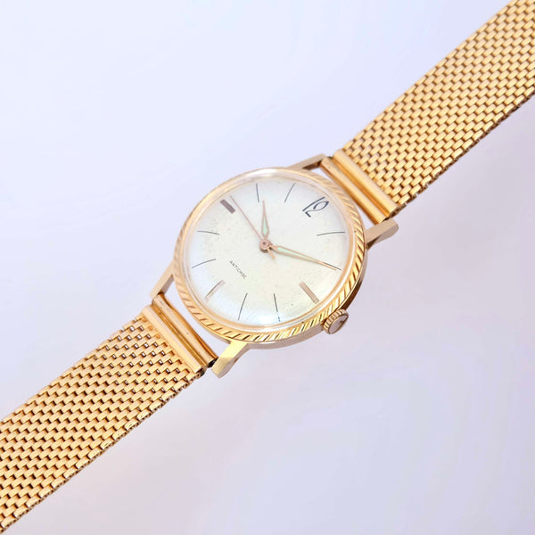 Montre costume anonyme fine années 1960 plaquée or