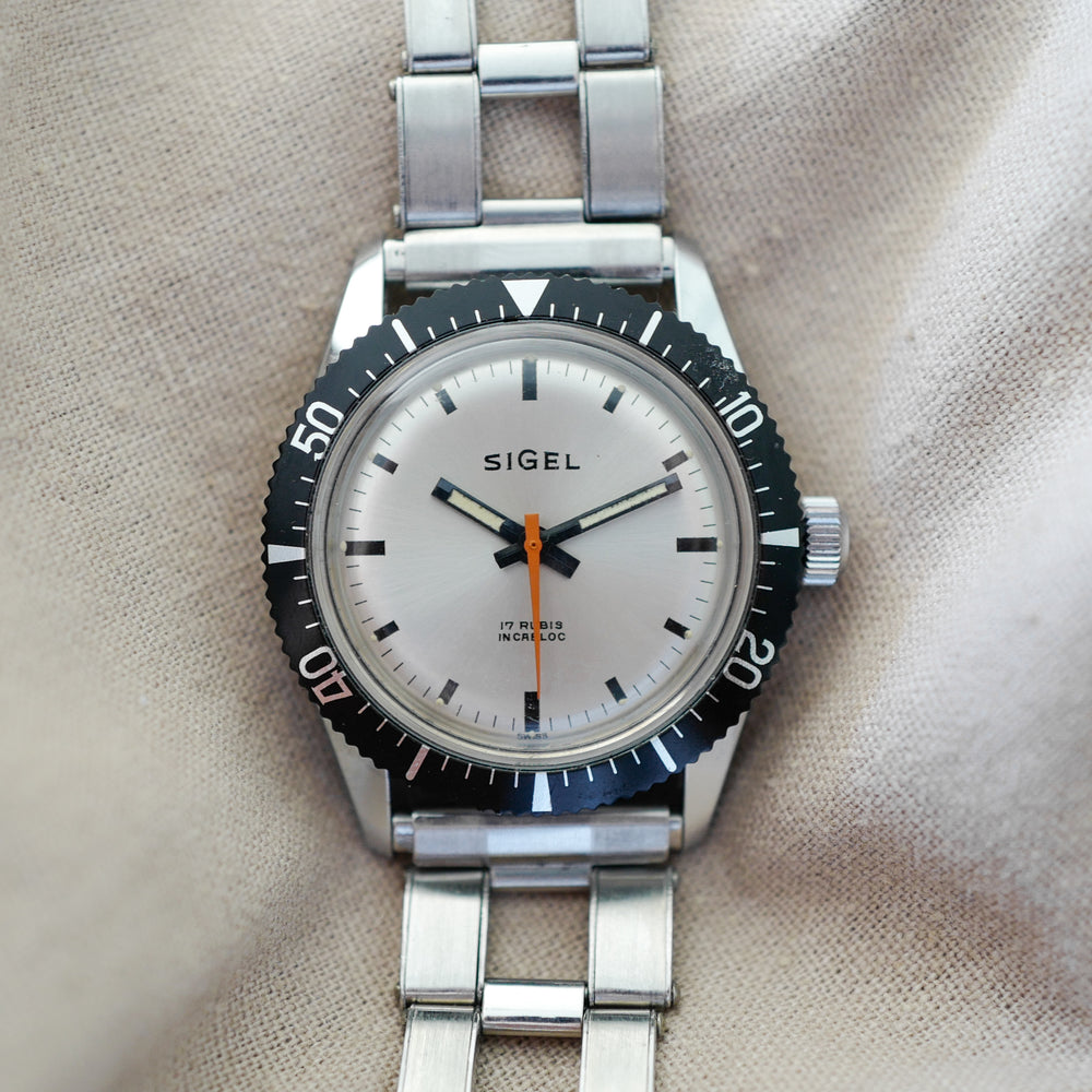 Montre de plongée ancienne vintage Sigel panda bracelet rivet