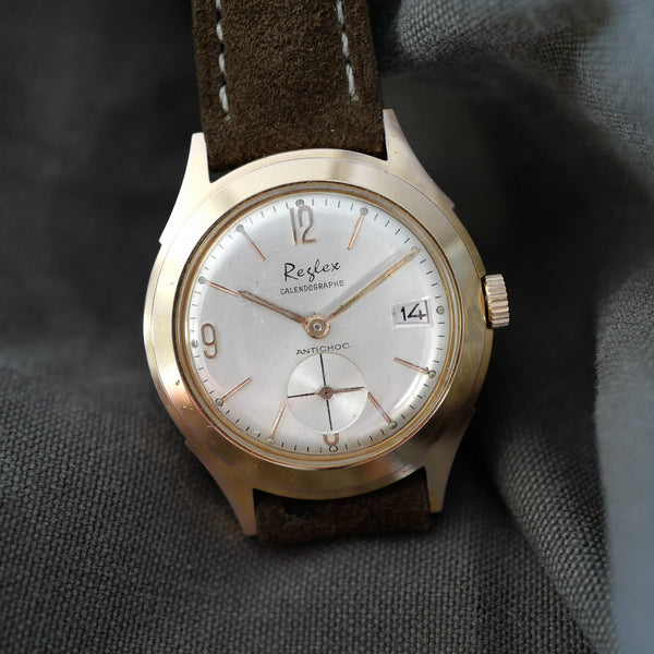 Montre doré plaquée or date mécanisme