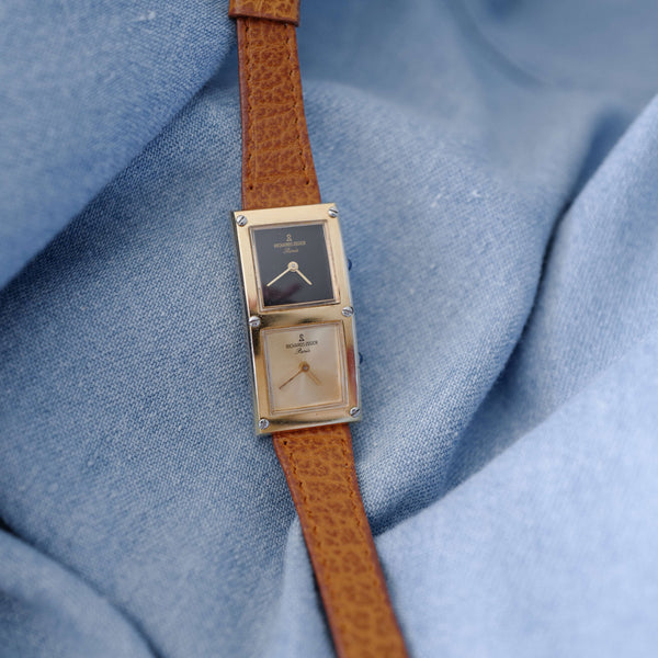 Montre dorée femme