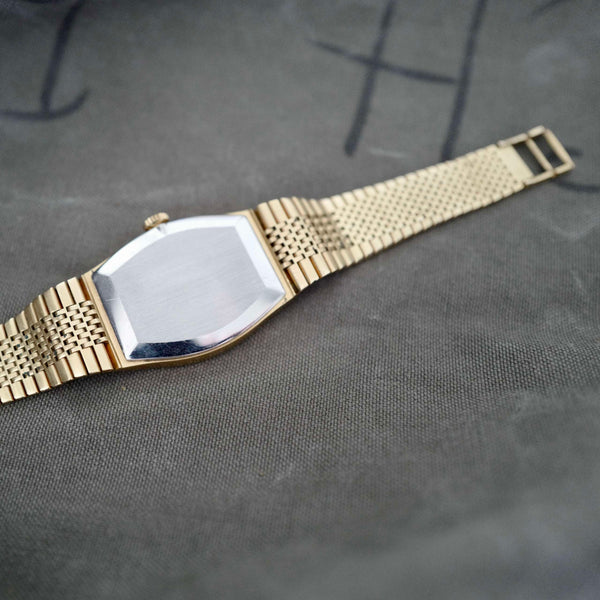 Montre rectangulaire carrée Longines vintage dorée