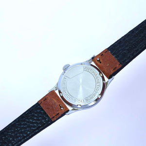 Montre femme cuir marron ancien