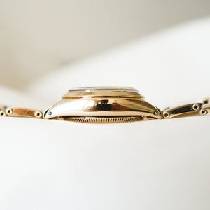 Montre femme Rolex petite or jaune bracelet rivet