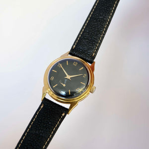 Montre fond noir vintage ronde
