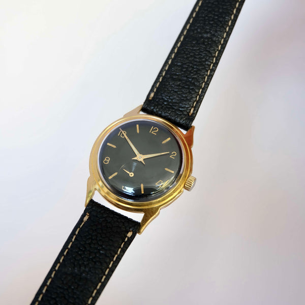 Montre fond noir vintage ronde