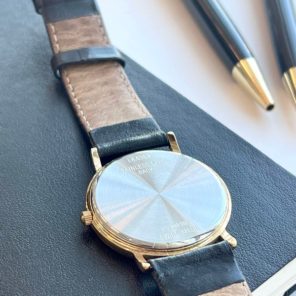Montre Longines double signature