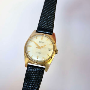 Montre lunette cannelée ancienne automatique