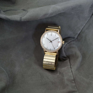 Montre mécanique fixoflex doré ancienne