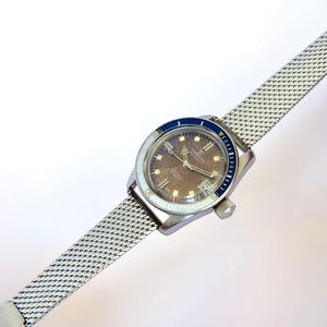 Montre patinée plongée ancienne