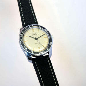 Montre plongée vintage banche et noir