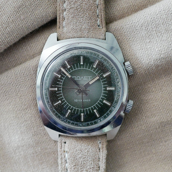 Montre réveil mécanique ancienne