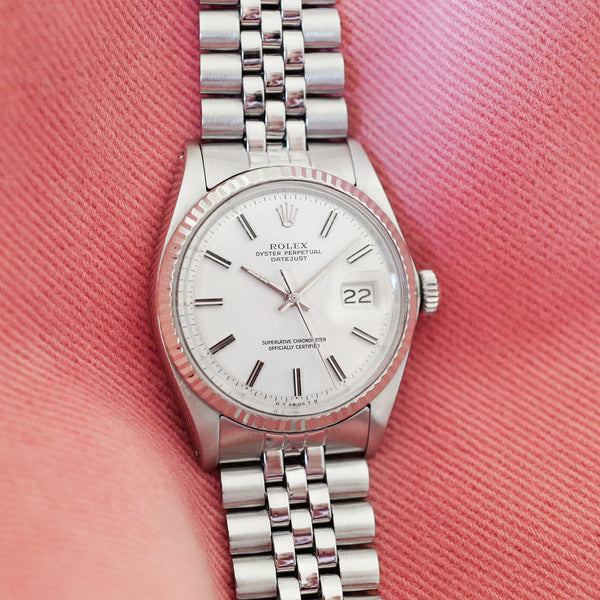 Montre Rolex ancienne 1601 cadran blanc jubilee cannelée