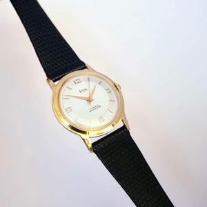 Montre ronde ancienne oversize mécanique