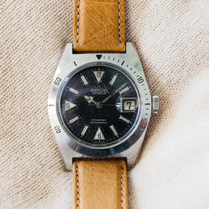 Montre vintage cadran noir cuir marron