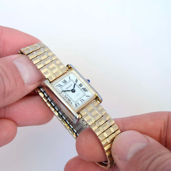 Montre vintage femme or carrée