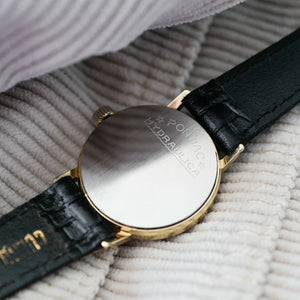Montre vintage mécanique manuelle dorée