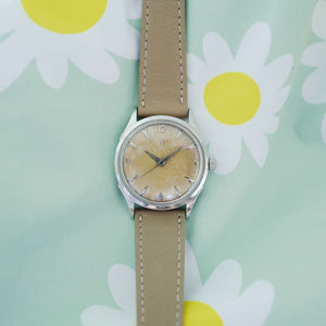 Montre vintage Omega bumper patine tropicale