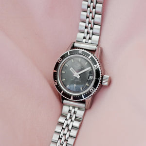 Montre vintage submariner femme ancienne