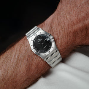 Omega Constellation acier et bracelet intégré au poignet