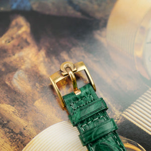 Boucle Omega d'origine et bracelet vert