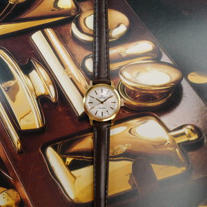 Montre OMEGA Genève avec bracelet marron