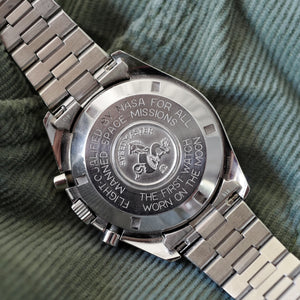 omega speedmaster tritium 3590.50 sur bracelet acier d'ori