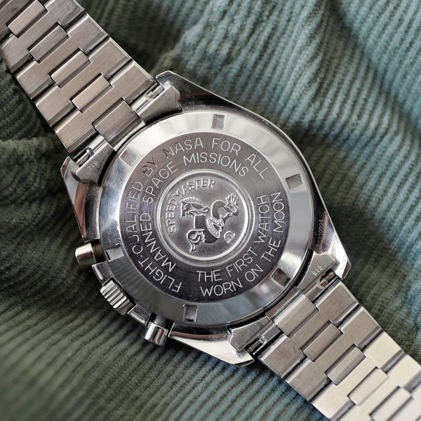omega speedmaster tritium 3590.50 sur bracelet acier d'ori