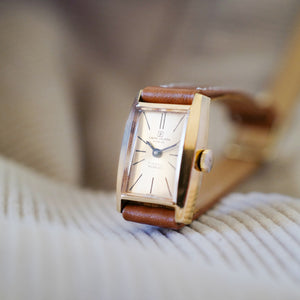 Petite montre pour femme or double-tour