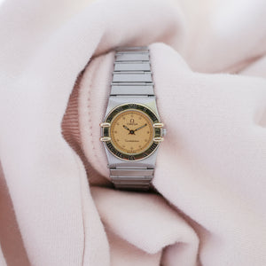 Petite Omega Constellation pour femme 795.1080 or acier