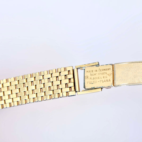 Poinçon plaqué or doré bracelet montre vintage