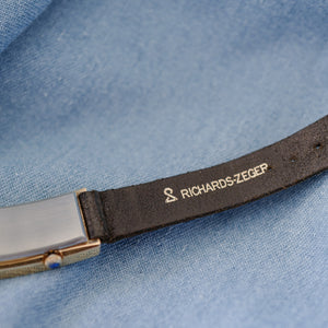 Rare montre femme dorée sur cuir noir
