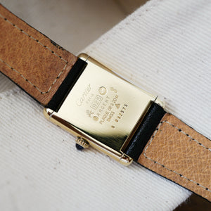 tres bon etat cartier tank must grand modele dore