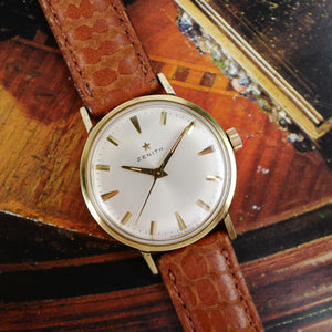 Aiguilles dauphine et étoile Zenith sur cadran argenté