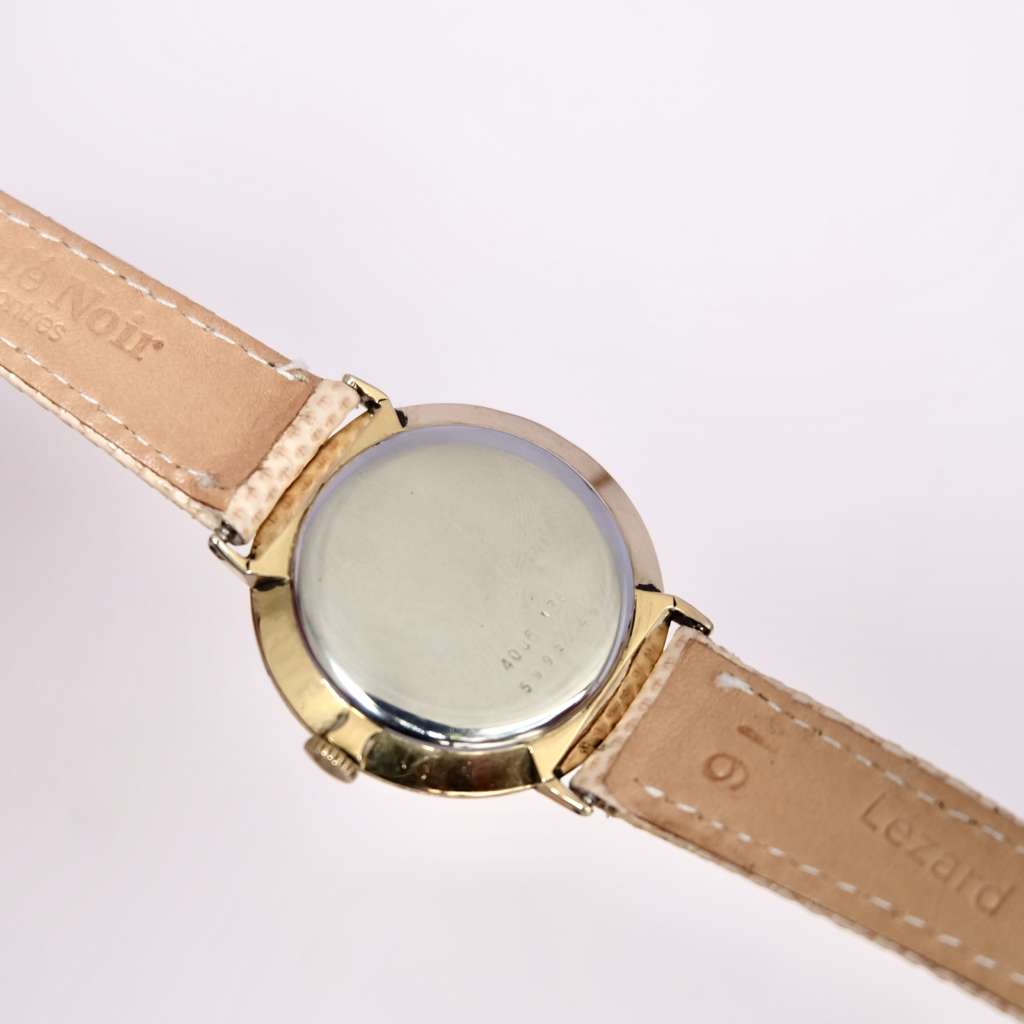 montre femme doree or fine mecanique a remonter plate ancienne