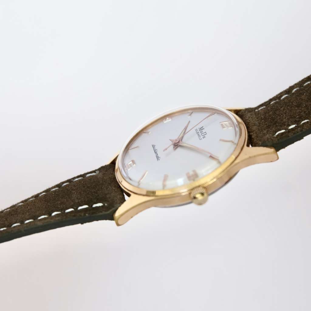 montre or mudu vintage