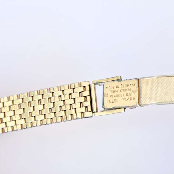 Poinçon plaqué or doré bracelet montre vintage