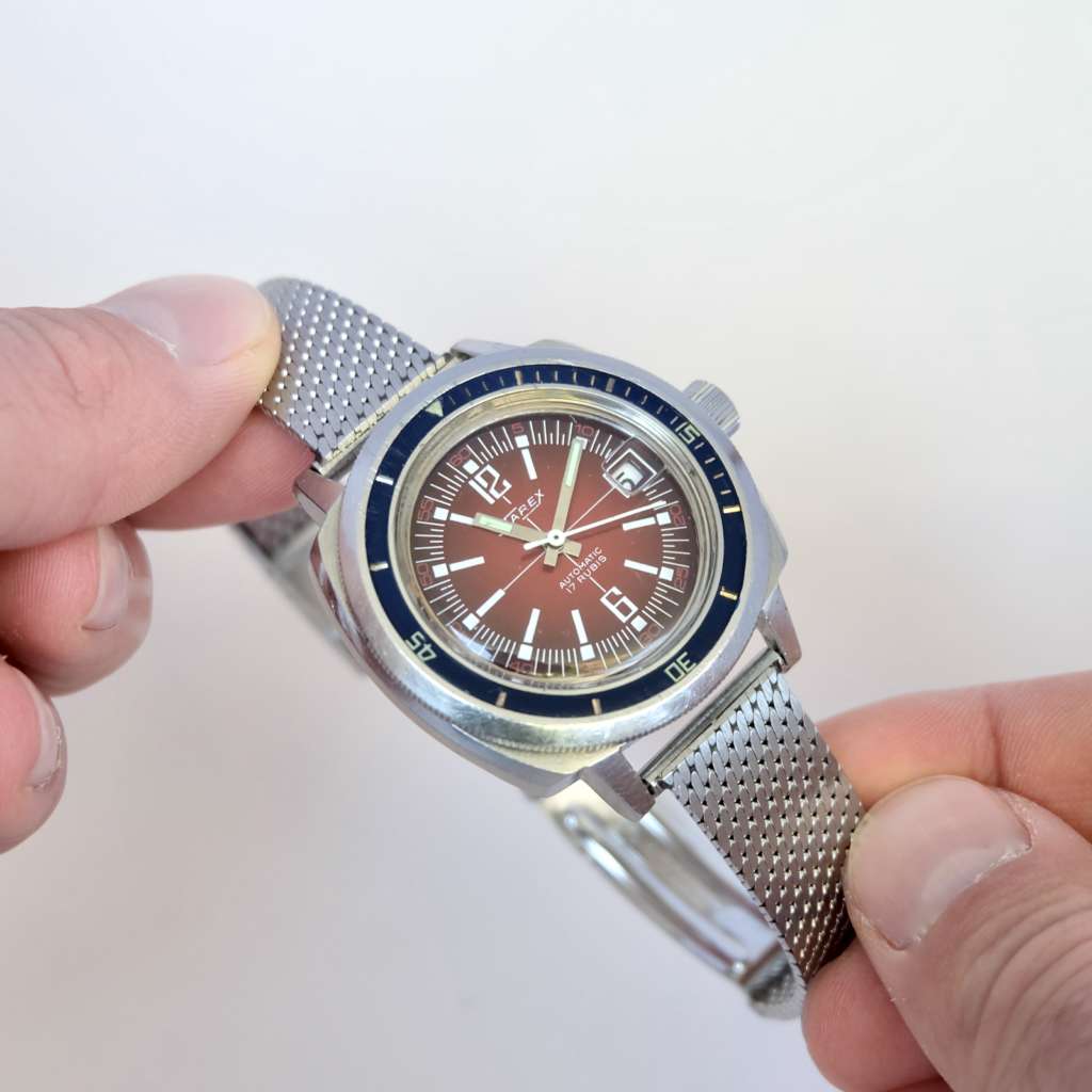 Baby panerai vintage Starex fond rouge