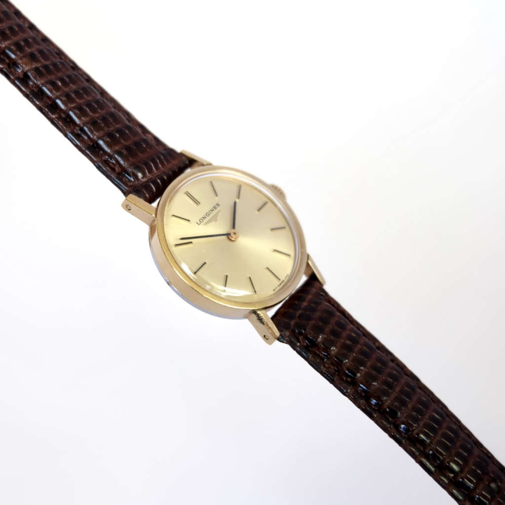 Mini montre femme or Longines ancienne Mini montre femme or Longines ancienne